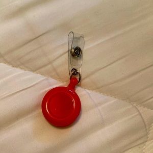 Plain ID clip with extendible reach